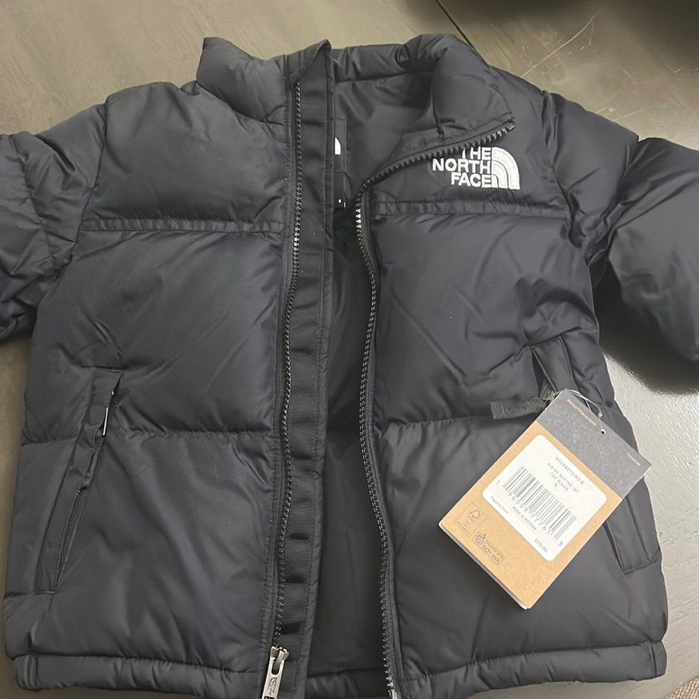 North face jacket can be worn for boy or girl brand new with tags
